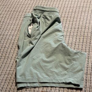 Men's lululemon pace breaker linerless 7” mint Green Shorts